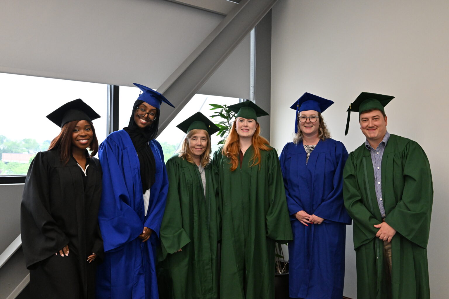 New Infinite Legacy staff celebrate graduating Donation University, an orientation program designed to teach new employees about organ, eye and tissue donation.